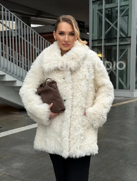 Белая шубка из тиградо - фото 17